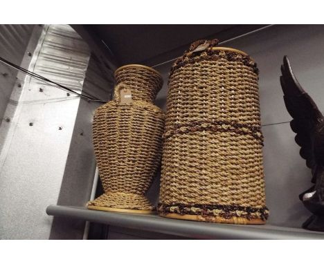 A wicker vase stick stand as new