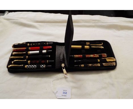 Eleven Jinhao roller ball pens with gold effect decoration housed in black case