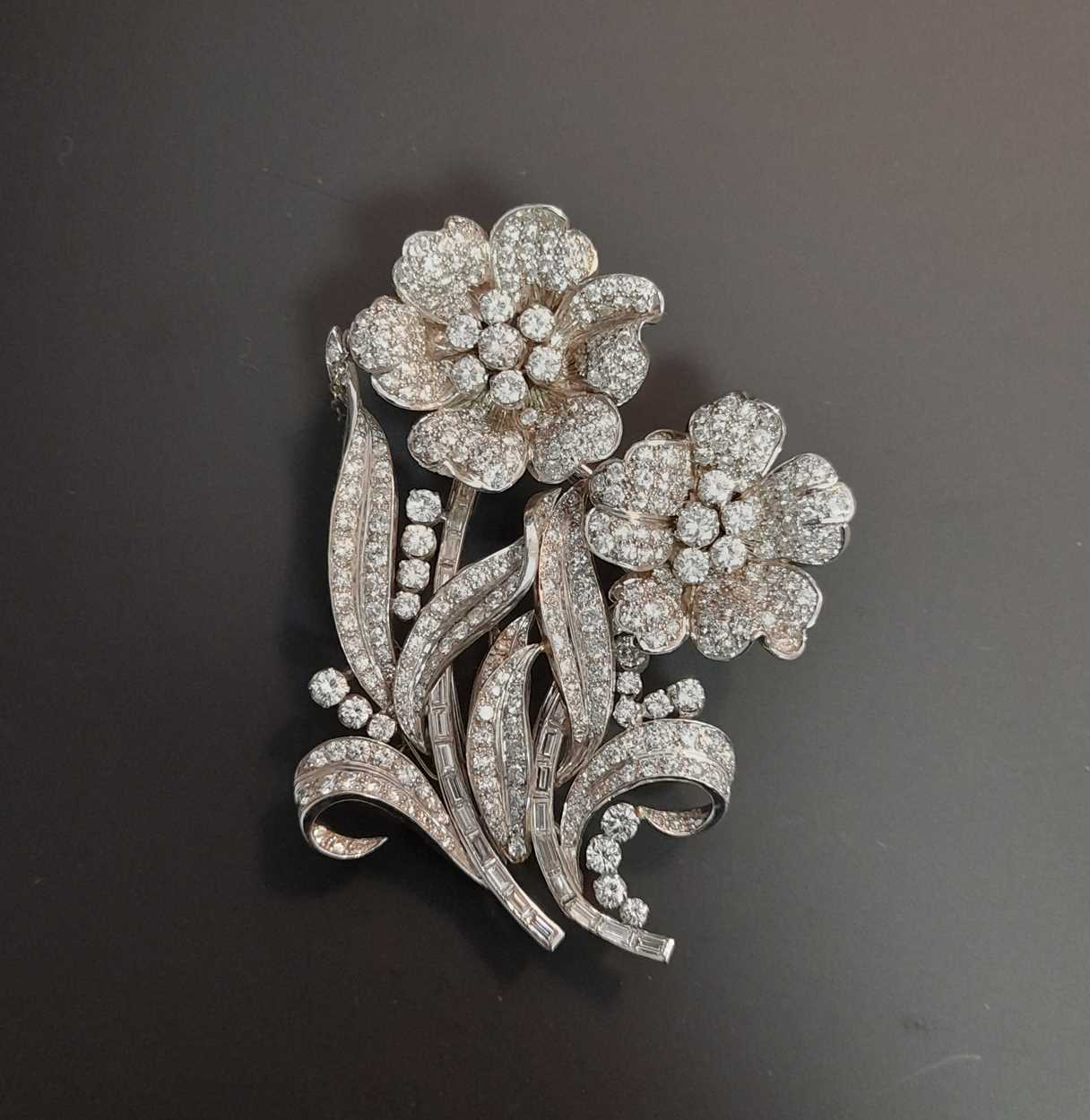 A mid 20th century detachable pair of floral spray brooches, in