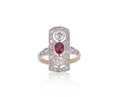 An Edwardian ruby and diamond panel ring, rubover set central oval faceted ruby, 5.6 x 4.5mm, estimated approximate weight 0.