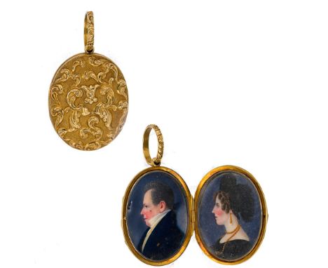 A Georgian portrait miniature hinged locket, oval form with repoussé design, interior with a portrait miniature of a smartly 