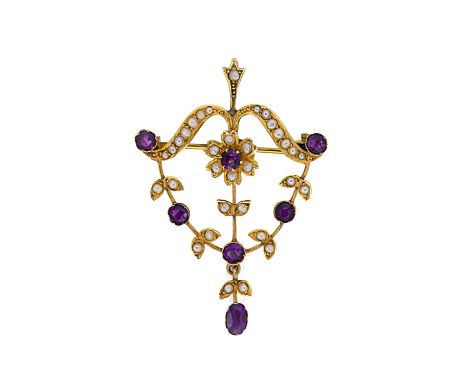 An Edwardian amethyst and seed pearl pendant/brooch, central peal and amethyst flower, surrounded by a swirl of pearls termin