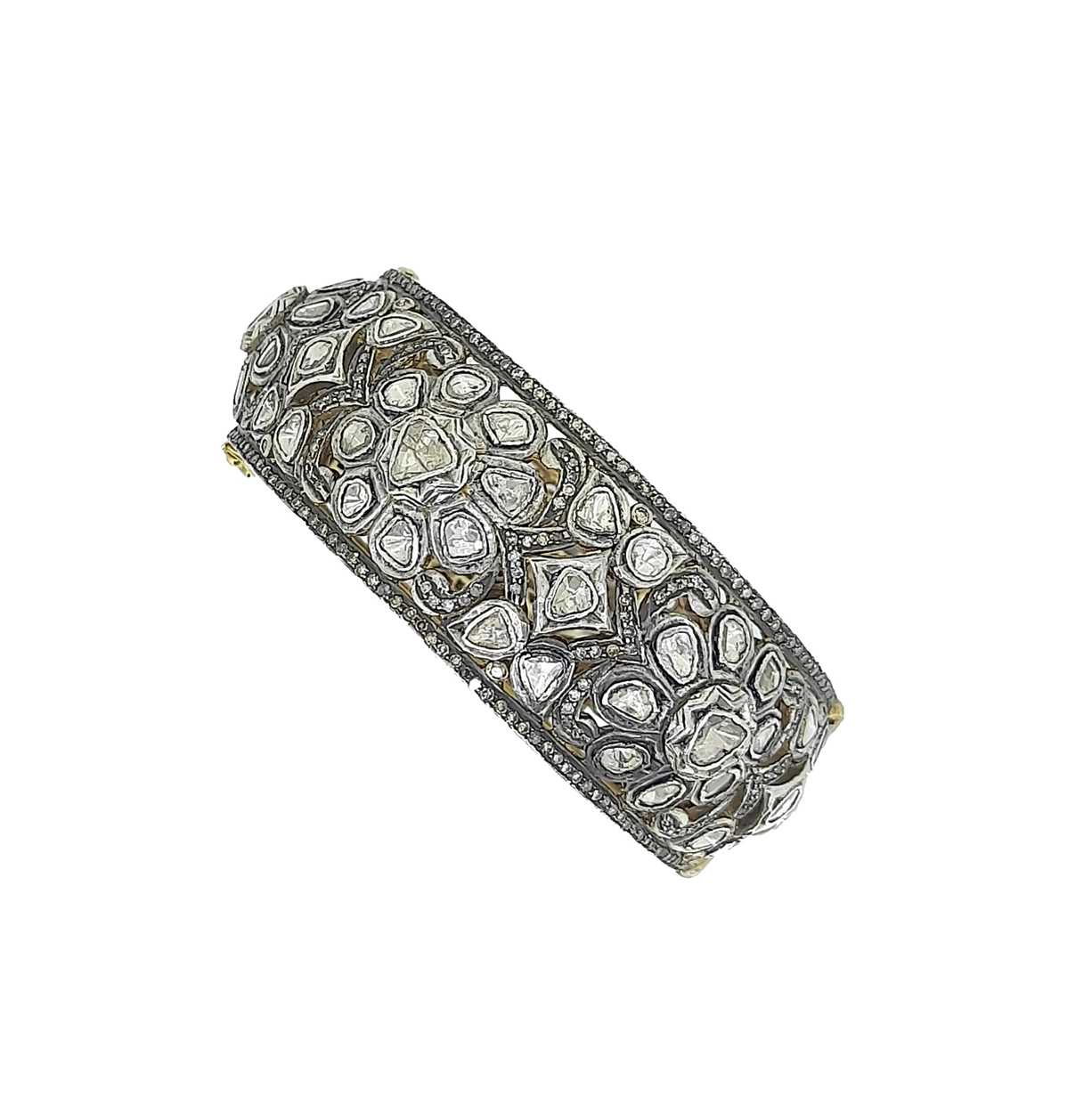 An Indian polki diamond bangle, in - Cheffins Fine Art