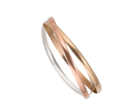 A 9ct three colour gold 'Russian' style bangle, yellow, rose and white plain polished bangles interlinked in the Russian styl