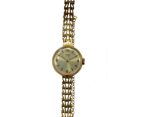 Tudor by Rolex - A lady's 9ct gold wristwatch, circa 1965, the signed circular silvered dial, 16mm diameter, with gold colour