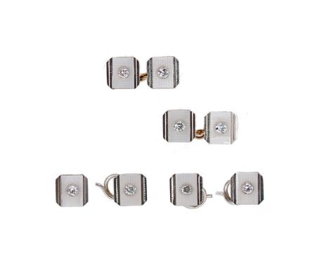 A pair of diamond set cufflinks with matching dress studs, each plate of the square links with truncated corners centrally ru