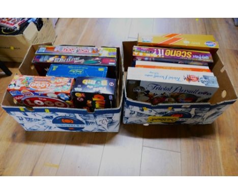 Two boxes of board games, Pass The Bomb, The Logo Board Game, Monopoly, Trivial Pursuit DVD edition etc