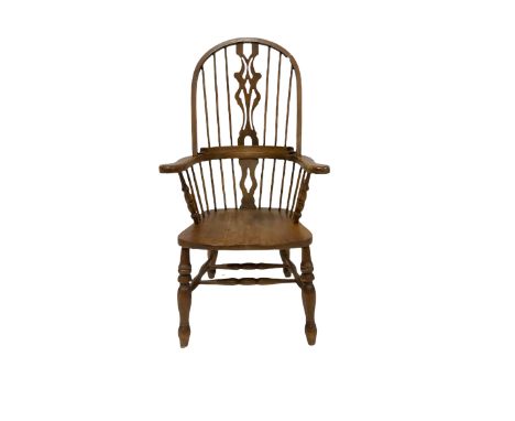 Beech Windsor armchair, stick and hoop back with shaped and pierced splat, dished seat on turned supports joined by double H 