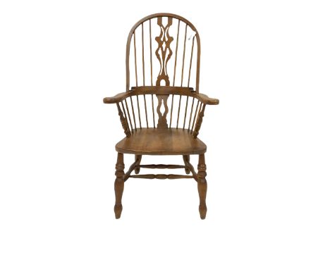 Beech Windsor armchair, stick and hoop back with shaped and pierced splat, dished seat on turned supports joined by double H 