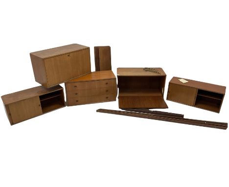 Mid-20th century Ladderax style teak modular wall shelving, with two fall front cupboards, one set of drawers and two section