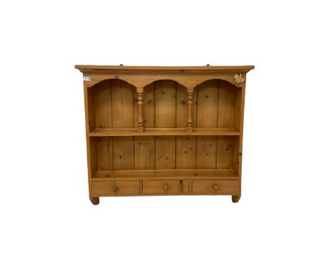 Pine wall plate rack, the projecting cornice and one plate shelf over three short drawers 