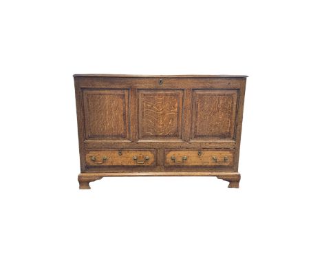 18th century oak mule chest, the lifting top opening to reveal three small drawers and cupboard, over two drawers, raised on 