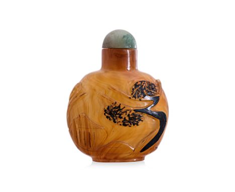 AN AMBER GLASS SNUFF BOTTLE
19th century, amber and clear glass, moon shaped bottle decorated in cut scenes of fisherman unde