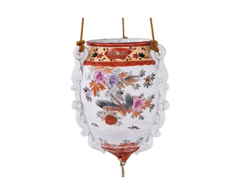 A JAPANESE KUTANI PORCELAIN HANGING PLANTER
Meiji period, ovoid form with three hanging loops, decorated in three sections of