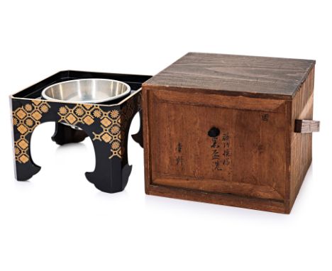 A JAPANESE SAKE CUP WASH BASIN AND LACQUER STAND
19th/early 20th century, square form black lacquered stand decorated in gilt