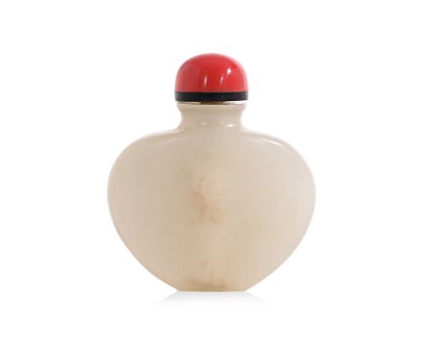 A SMALL JADE SNUFF BOTTLE 19th century, small bottle with rounded sides and wide shoulders narrowing to a flat base 4.5cm hig