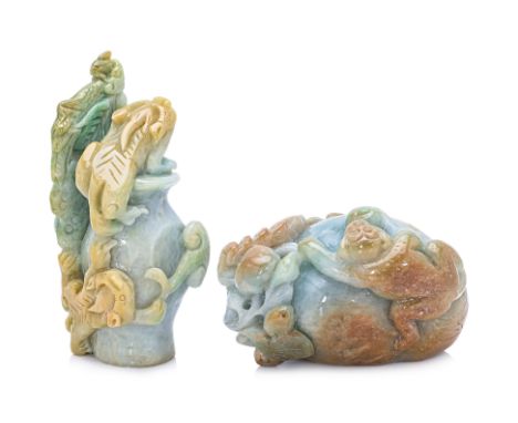 TWO JADEITE CARVINGS
20th century, green and honey-gold jadeite, two qilin climbing a vase beside a lingzhi tree and peacock.