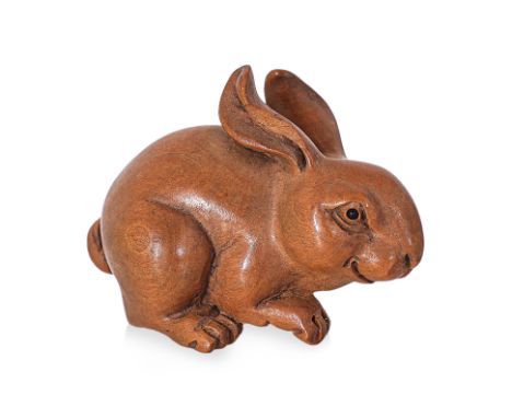 A JAPANESE BOXWOOD CARVED HARE NETSUKE
Modeled raising its left forepaw, artists mark incised to base
5.5cm long
Condition: C