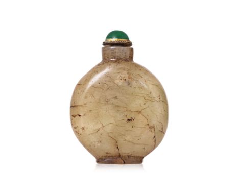 A PALE-GREEN AND RUSSET JADE SNUFF BOTTLE Late 19th/early 20th century, moon shaped bottle, recessed foot rim 8cm high Proven