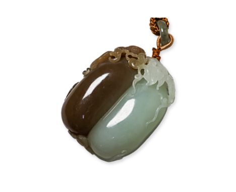 A CELADON AND RUSSET JADE 'MONKEY AND GOURD' PENDANT 20th century, brown-russet and pale celadon jade gourd with monkey climb