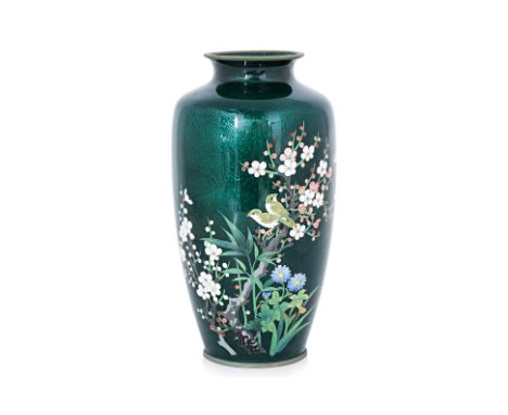 A JAPANESE CLOISONNE ENAMEL VASE
20th century, dark green ground decorated in birds and cherry blossoms
24cm high
Condition: 