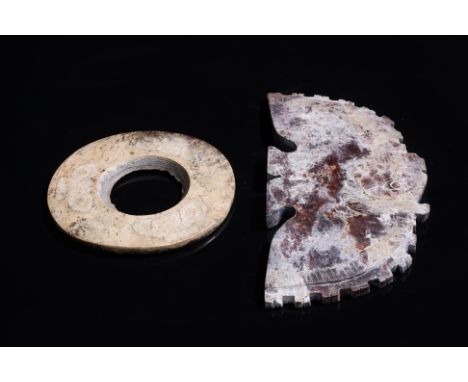 AN ARCHAISTIC JADE BI DISC AND PENDANT
A bird-form pendant with ridged outer edges, incised decoration, together with a disc,