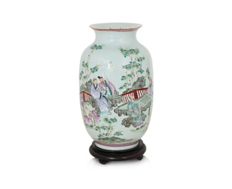 A FAMILLE ROSE 'SCHOLARS AND BAMBOO' LANTERN VASE
Late 19th/20th century, decorated bamboo grove scene with scholars, cracked