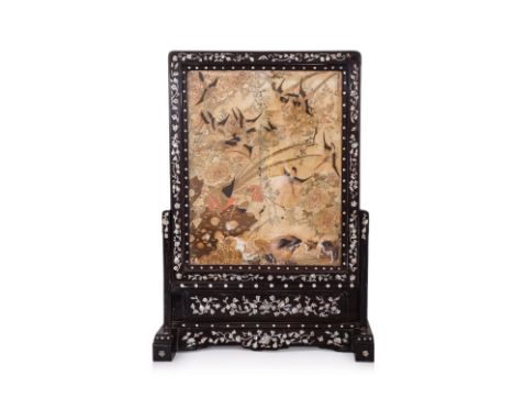 A MOTHER OF PEARL INLAID BLACKWOOD TABLE SCREEN
Late 19th/early 20th century, the frame and stand with mother of pearl foliat