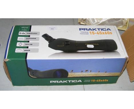 A Praktica telescope and tripod in box 