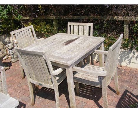 A teak 90cm square garden table with four matching chairs