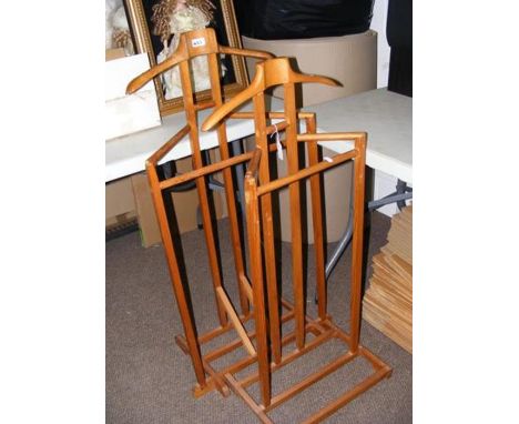 Two light wood valet units 