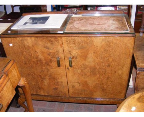 The matching walnut 100cm two door cabinet with two drawers to the insideCONDITION REPORTIn our judgement, condition of lot i