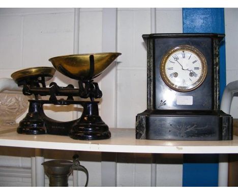 A Victorian two train slate mantel clock, together with an antique pair of scales 
