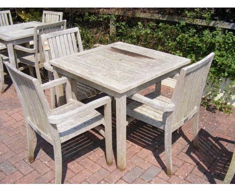 A teak 90cm square garden table with three matching chairs