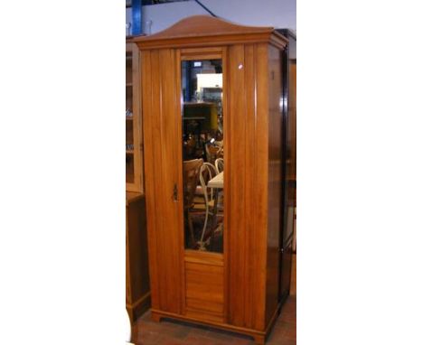 A light wood wardrobe with mirrored central door - width 92cm 