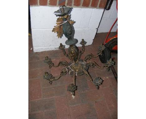 An eight branch metal ceiling light