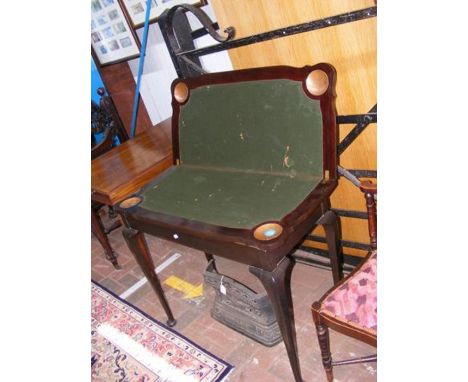 A 1920's fold over games table