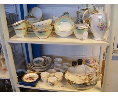 A quantity of Fine English 'Southern' Bone China, together with other tea and table ware - on two shelves 