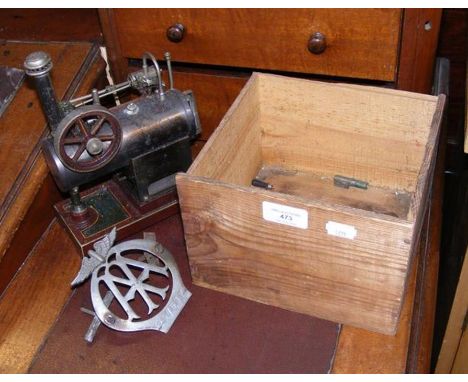 A model steam engine, together with AA badge 