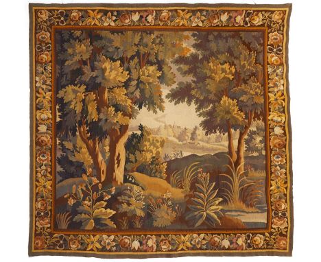 Belgian tapestry depicting a tree-filled landscape with distant hills in the background, ca. 1900-1910. The central image is 