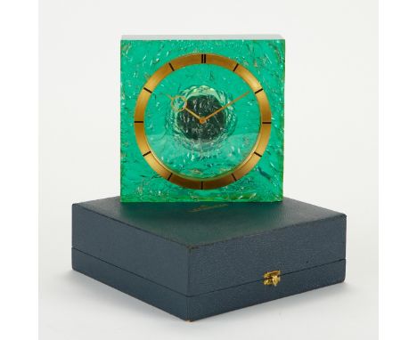 Le Coultre Co., Switzerland. Mid-century modern green resin and brass table clock. The emerald green transparent resin case f