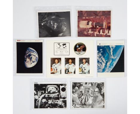 Group of six original NASA color photographs with one lithograph of astronauts. The group includes:One photograph from the Ke