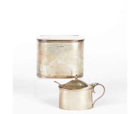 Group of two pieces of English sterling silver. One handled sugar bowl with spoon, lined with cobalt glass, and one tea caddy