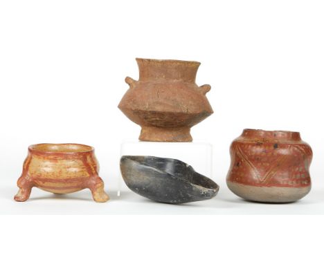Group of four pre-Columbian ceramic vessels. Includes one tripod bowl with red decoration, one black bowl or low pitcher, one