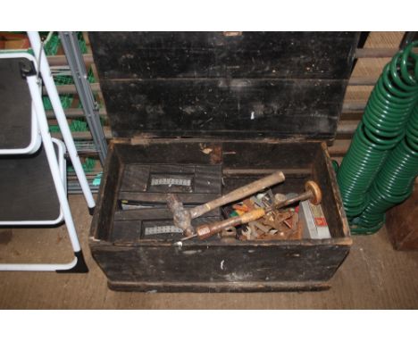 A wooden box of tools