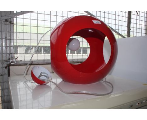 A retro red metal light fitting