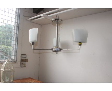 A metal three branch ceiling light