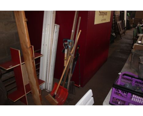 A quantity of mostly long handled garden tools