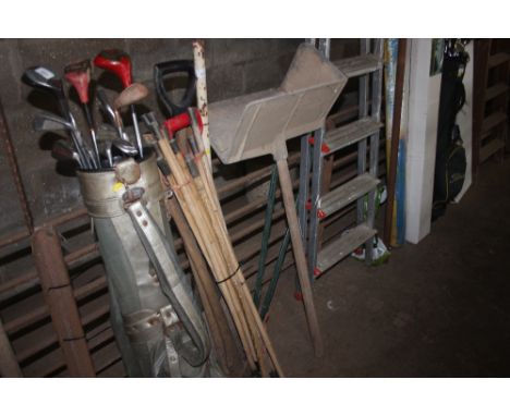 A quantity of drain rods; a brick hod and various tools