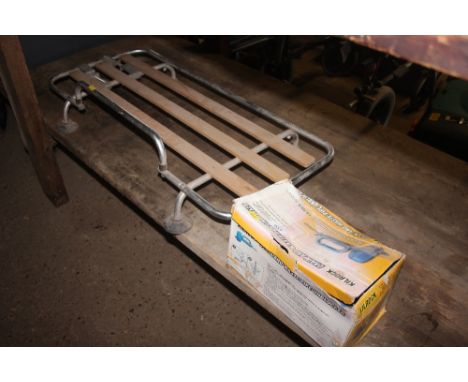 A drain and waste pipe unblocker and a suitcase car rack